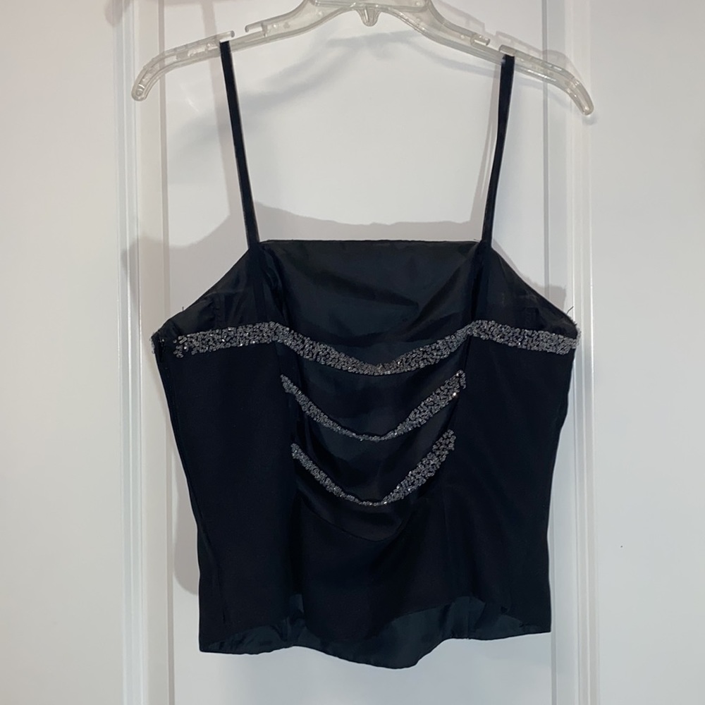 Black floor length formal dress.